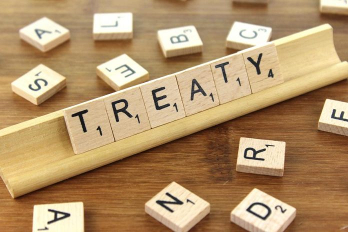 Treaties as contract theory textualism and interpretation